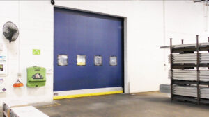 Area separation with fabric doors